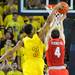 Michigan sophomore Trey Burke bats the ball away from Ohio State junior Aaron Craft during the last minute of overtime at Crisler Center on Tuesday, Feb. 5. Melanie Maxwell I AnnArbor.com